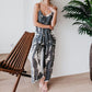 👗🌸 Damesmode: jumpsuit met spaghettibandjes en print ✨🦋