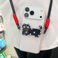 Schattige telefoonclip met cartoondier en koord