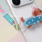 Schattige telefoonclip met cartoondier en koord